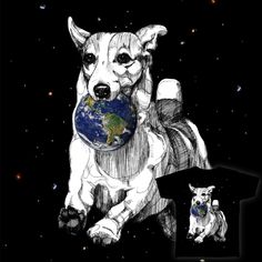 a t - shirt with a drawing of a dog holding the earth in it's paws