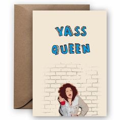 a card with the words yass queen on it and an image of a woman in front of a brick wall