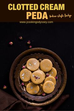 a bowl filled with cookies sitting on top of a table