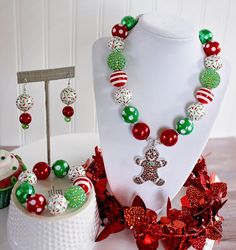 "Made with an adorable rhinestone Gingerbread Man pendant, this colorful and sparkly necklace is sure to make a little girl's eyes light up! A festive Christmas palette of red and green, along with Christmas sprinkles beads, is the perfect thing for Christmas baking. Makes a great stocking stuffer or Christmas present. Visit my Christmas section for more festive necklaces: https://www.etsy.com/shop/ChunkyStuffByLBB?section_id=16141299&ref=shopsection_leftnav_5 ✔ All necklaces come with a 2\" Fun Christmas Crafts For Toddlers, Christmas Necklaces, Holiday Jewelry With Colorful Beads, Christmas Beaded Necklaces, Christmas Necklace Diy, Multicolor Round Beads Jewelry For Holidays, Holiday Festive Jewelry With Colorful Beads, Holiday Jewelry With Colorful Round Beads, Holiday Colorful Beaded Jewelry