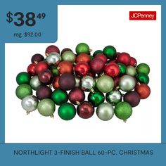 a pile of christmas ornaments sitting on top of a blue and white background with the price $