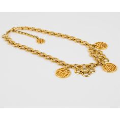 This elegant Louis Feraud Paris choker necklace features a romantic chain-necklace shape with gilded ornate iconic brand logo charms. The necklace closes with a lobster closing clasp and an extra chain gives length flexibility to the necklace. Another Feraud brand logo is attached to the chain extension.  Measurements: The necklace's total length is 20.08 in (51 cm) - width is 1.44 in wide (3.6 cm)  Please see the measurements noted above in the description for the best approximate dimensions. Vintage Gold Necklace With Gold-tone Logo Plaque, Vintage Necklace With Logo Charm For Formal Occasions, Formal Gold Chain Necklace With Logo Charm, Elegant Gold Necklace With Logo, Elegant Gold-tone Chain Necklace With Logo Charm, Luxury Metal Chain Necklace With Logo Charm, Luxury Chain Link Necklaces With Logo Charm, Elegant Metal Necklace With Logo Charm, Elegant Gold Chain Necklace With Chain Print