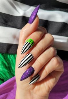 halloween nails 2024. beetlejuice nails. Beatleguese Nails, Beetlejuice Toenails, Halloween Beetlejuice Nails, Beetle Juice Nail Art, Beetlejuice Inspired Nails, Almond Shape Halloween Nails, Bright Halloween Nails, Freddy Nails, Bettle Juice Nail Ideas