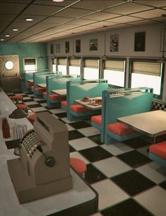 the interior of a diner with checkered flooring and red seats, tables and booths