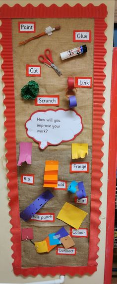 a bulletin board with different types of paper and crafting supplies attached to the wall