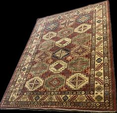 Add a touch of timeless craftsmanship to your space with this stunning 6x8 ft Caucasian Tribal Rug. Hand-knotted from high-quality wool, this rug showcases intricate geometric patterns and vibrant colors, characteristic of traditional Caucasian designs. The rich reds, greens, and creams come together in an eye-catching composition, perfect for adding warmth and elegance to any room. Whether used as a statement piece in your living room or as a luxurious accent in a cozy reading nook, this one-of-a-kind rug is sure to elevate your home decor. *Hand-knotted with 100% wool *Durable and perfect for high-traffic areas *Traditional Caucasian design with geometric patterns *Ideal size for living rooms, dining rooms, or bedrooms Caucasian Rug, Cozy Reading Nook, Cozy Reading, Reading Nook, Geometric Patterns, Floor Rugs, Statement Pieces, Halloween Shopping, Shop House