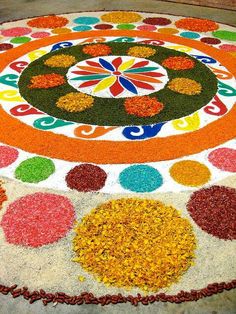 a colorful carpet with flowers and circles on it