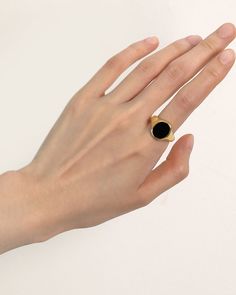 A large black lake with a wavy outline located in this signet ring, which indicates the dynamic changes during the long journey of life. The subversive yet minimalistic vibe blends a statement of confidence for you. Whenever you have a glance at it, it will always remind you that - face the obstacle that comes and goes, feel the changes, and embrace them with no fear anymore.


 




Band Width:12.5mm
Band Thickness:1.8mm
Stone:Black Onyx
Material:Black Onyx, 18k Gold Plated On Brass Formal Gold Signet Ring With Onyx, Oval Onyx Signet Ring With Gemstone, Luxury Elegant Onyx Signet Ring, Luxury Oval Onyx Signet Ring, Elegant Yellow Gold Onyx Signet Ring, Journey Of Life, Long Journey, Onyx Ring, Signet Ring