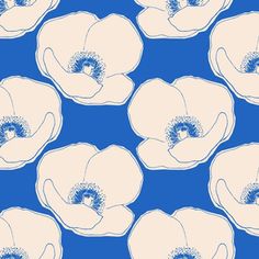 a blue and white flower pattern with an oval center in the middle on a blue background