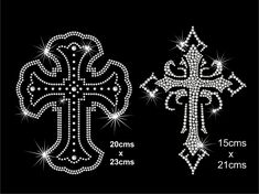 two cross designs on black background with white and silver diamonds in the middle, one is made out of swarong crystals