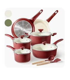 red pots and pans with utensils on the bottom one has a spatula in it