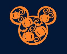 an orange mickey mouse head with pumpkins on it