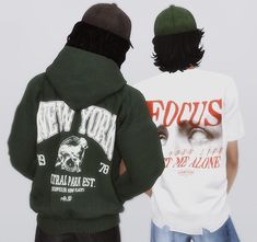 two young men standing next to each other in front of a white wall with the words new york on it