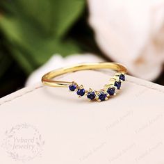 Please confirm your US size when you make an order)========================================================================================Jewelry Details-Gold Type : 14k goldStones Type: Lab Created SapphireTotal Carat Weight: approx. 0.26ctwBand Width: Approximately 1.4mmSKU: YR0521-Band========================================================================================~*-*~Purchase Guarantee:- All our jewelry is handmade, and each process is refined.- 14 Day Refund Guarantee.- All our pro Gold Sapphire Ring Engraved For Anniversary, Anniversary Yellow Gold Lab-created Sapphire Ring, Vintage Open Sapphire Ring Gift, Curved Sapphire Wedding Band, Vintage Yellow Gold Sapphire Jewelry, Oval Cabochon, Black Quartz, Curved Wedding Band, Matching Band, Stackable Rings