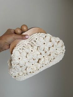 Crochet Raffia Bag, Beige Luxury Handbags, Mothers Day Gifts, Vintage Clutch Bag, Handmade with Motifs Clutch Bag for Women,Gift for Her  ❤️You will love this handmade crochet bag ❤️ ⭐️ A complete complement that you can use anytime, anywhere, day or night. ⭐️ Easy to use with wooden handle ⭐️ Lined inside, does not stretch The inside of the bag is wide, You can easily carry your personal belongings. Specification and materials of this piece: Rafia Yarn, Board Scholarship, lined inside Width: 32 Handmade White Clutch For Daily Use, Eco-friendly Handmade Clutch Bag, Eco-friendly Cream Pouch Bag, Handmade Cream Clutch Shoulder Bag, Handmade White Clutch Pouch, Handmade Beige Tote Pouch, Handmade Beige Handheld Pouch, Handmade Cream Clutch For Daily Use, Cream Bag With Detachable Handle As Gift