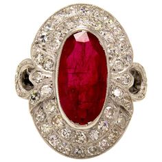 A Breathtaking Vintage 18K White Gold (tested) Elongated Oval Ruby ring. CIRCA 1940s. The RUBY is estimated 3.50CT with measurements of 14.65x7.80x3.35 mm. GIA Certified in Dark beautiful Transparent Red color, Natural with some small imperfections and treatments such as heating and fracture filling, common for most rubies, all indicated on the GIA report, Bezel set. Beautiful Deep Red Color is perfectly accented by 2 rows of Near-colorless G-H, VS-SI clarity Old Single cut Diamonds. Estimated t Ruby Engagement Ring Vintage, Vintage Cluster Ring, Jewellery Store, Jade Ring, Ruby Jewelry, Deco Jewelry, Art Deco Diamond, Tk Maxx, Vintage Jewels