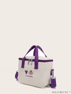 a white and purple lunch bag sitting on top of a table