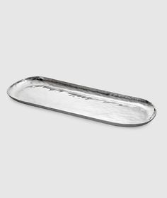 Our sleek Oceana Oval Tray is so practical, you will find many ways to use it. Perfect for serving whole fish, seafood, or slices of roasted meats. Dishwasher safe and no polishing!    16" x 6" or 18" x 9"  18/8 stainless steel]  Dishwasher safe  Food safe  100% recyclable  Sustainable Ice Scoops, Design For Kitchen, Fish Platter, Luxury Tableware, Spa Products, Square Tray, Stainless Steel Dishwasher, Oval Tray, Roasted Meat