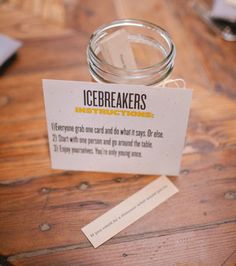 a jar with icebreakers on it sitting on a table next to a piece of paper