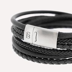 This wraparound bracelet stack, handcrafted from fine grade genuine leather and meticulously braided, is a timeless classic marked by elegance.- WIDTH: 12 mm- MATERIAL TYPE: 100% genuine Cowhide leather- CLASP COLOR: Brushed silver- CLASP MATERIAL: 316L stainless steel- CLASP TYPE: Magnetic Domino Jewelry, Double Wrap Bracelet, Platinum Wedding Rings, Wedding Rings Rose Gold, Star Jewelry, Gold Bangle Bracelet, Cufflinks Men, Rose Gold Bracelet, Bangles Jewelry