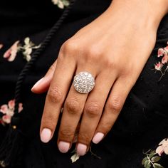 The Story From the early Art Deco era, this antique ring is filled to the brim with a stunning 4.38 carats of bright Old European cut diamonds. Ranging in size from 0.21 to 0.25 carats each, the 19 antique cut diamonds are beautiful and sparkling. All done in 14k white gold, the cool metal makes the H-I diamonds appear even brighter. Moving down the setting is an open work gallery and engraving on the band. Top craftsmanship is evident in the design of this stunning ring. A cluster design with t Dazzling Sterling Silver Diamond Ring With Rose Cut, Luxury Engraved Diamond Ring, Timeless Round Diamond Engraved Ring, Timeless Diamond Engraved Ring, Timeless Round Engraved Diamond Ring, Luxury Dome Ring With Diamond Cut For Wedding, Luxury Dome Ring With Rose Cut Diamonds For Anniversary, Luxury Rose Cut Diamond Dome Ring For Anniversary, Dazzling Platinum Diamond Ring With Rose Cut Diamonds