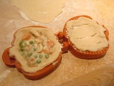 two small pies sitting on top of a counter