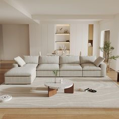 a living room filled with furniture and a white rug