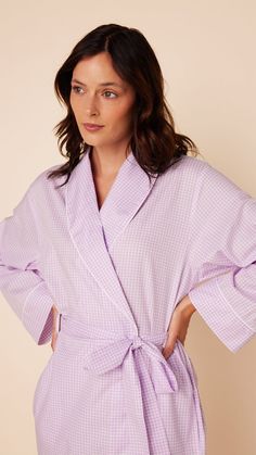 Luxe Pima is an ultra-soft, super light weight tightly woven cotton. It is our highest quality fabric and is ideal for warmer climates or people wanting a light PJ set. 100% hand-pulled Pima Cotton This shawl-collared robe has piping detail at the neck edge Perfect to pair with your favorite PJs! Robe has below-the-knee length and two side pockets Machine wash cold - tumble dry low - no bleach Robe is not preshrunk and will shrink approximately 1/2 inch when washed Made in Peru Lavender Cotton Sleepwear For Spring, Cat Pajamas, Blue Gingham, Pj Sets, Pima Cotton, Cotton Weaving, Gingham, Shawl