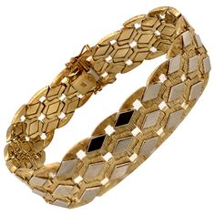 Vintage 1960's 14K Two Tone Gold Wide Retro Bracelet - The bracelet measure 7 3/4 inches long and 1/2 inches wide. It features a diamond pattern in white gold links over a yellow gold base. There is a hidden clasp with a double figure 8 safety for added security. The bracelet weighs 25.8 grams. Faceted Bead Bracelet, Retro Bracelet, 18k Gold Bracelet, Gold Bracelet Set, Gold Link Bracelet, Rose Gold Beads, Wide Bracelet, Figure 8, Yellow Gold Bracelet