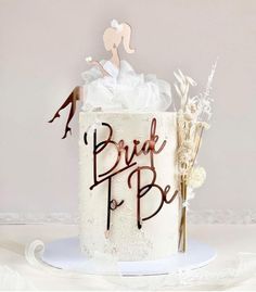 a wedding cake with the word bride to be on it