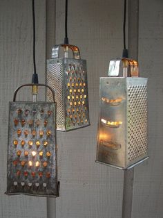 three hanging lights that are made out of tin cans and some glass beads on them