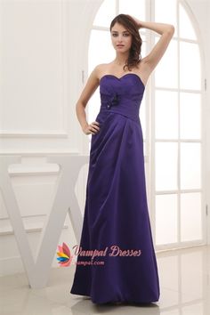 a woman in a strapless purple dress