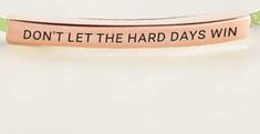 a bracelet that says don't let the hard days win