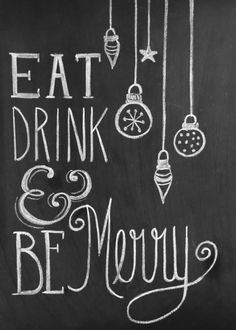 a chalkboard with the words eat drink and be merry written on it