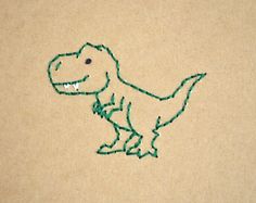 a drawing of a dinosaur on a piece of cardboard