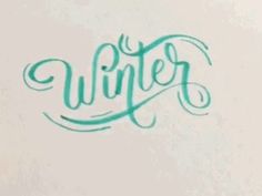 the word winter written in cursive writing on a white paper with green ink