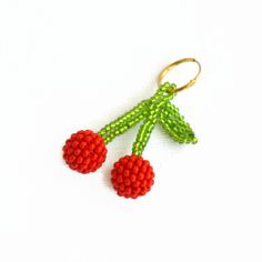 Beaded Cherry  Hoop Earring Fruit Beads Charms trendy earrings Jewielry. the price is for one earring Materials Czech beads total earring length 5 cm (2 inches) diameter hoops earrings 1.4 cm (1/2 inch) ● If you want different color or size, feel free to let me know before ordering and I will make it to order in 3-5 days. Please note that due to lighting effects, monitor's brightness, contrast and other settings, there might be some slight differences in the color tone/shade of the web site's photo and the actual item. Thank you very much for visiting my shop Red Dangle Clip-on Earring, Red Dangle Single Clip-on Earring, Handmade Cherry Colored Round Bead Jewelry, Cherry Beaded Round Bead Jewelry, Handmade Red Drop Earrings, Trendy Red Nickel-free Hoop Earrings, Trendy Red Beaded Earrings, Trendy Nickel-free Beaded Earrings With Round Beads, Trendy Nickel-free Beaded Earrings