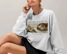 Gildan 18000 **If you are S get M or L for loose-oversized look. If you are L get XL or 2XL. If your size is not in stock please reach out so we can double check for you. **Apparel/design colors may vary across devices. Ideal for any situation, a unisex heavy blend crewneck sweatshirt is pure comfort. These garments are made from polyester and cotton. This combination helps designs come out looking fresh and beautiful. The collar is ribbed knit, so it retains its shape even after washing. There Oversized Aesthetic Sweatshirt With Graphic Print, Oversized Graphic Print Aesthetic Sweatshirt, Artistic Oversized Long Sleeve Sweatshirt, Artistic Oversized Crew Neck Sweatshirt, Oversized Artistic Sweatshirt With Graphic Print, Oversized Artistic Graphic Print Sweatshirt, Artistic Relaxed Fit Sweatshirt For Fall, Italy Coast, Coast Outfit