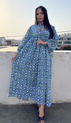 "DESCRIPTION gorgeous green blue flower fan printed maxi dress / Henley neckline boho maxi dress / 34th sleeve with buttons maxi dress Indian (Jaipur) Traditional Hand Block Printed Dresses for summer vacations, beaches wear, party wear, and more occasions to wear this dresses. PRODUCT DETAILS: 3/4th sleeve, Henley neck, Long dress FABRIC: soft and breathable cotton cambric WASH CARE:  wash in cold water, air dry in shade.. SLEEVE LENGTH - 18 inch Size chart is mentioned in images. Size chart is Modest Green Spring Maxi Dress, Green Floral Print Long Sleeve Kaftan, Modest Floral Print Maxi Dress For Vacation, Floor-length Green Maxi Dress With Floral Print, Modest Green Flowy Maxi Dress, Modest Long Sleeve Maxi Dress For Beach, Beach Modest Long Sleeve Maxi Dress, Green Floor-length Floral Maxi Dress, Green Floral Print Maxi Dress