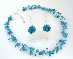 "Turquoise Blue Necklace and Earrings, Bridesmaid Jewelry Set, Silver Gemstone Jewelry, summer nautical colors weddings accessories A bridesmaid jewelry set of a sweet and petite blue turquoise short necklace made of non-tarnish silver wire, wrapped with 6-rows of genuine, natural turquoise stone chips and a matching pair of earrings, (like the ones listed individually here: http://www.etsy.com/listing/83412744/autumn-fall-fashion-crochet-knitted Made to Order will ship in 1-2 weeks It is 15-16\ Turquoise Necklace With Matching Earrings, Turquoise Necklace With Matching Earrings As Gift, Elegant Blue Turquoise Necklace, Elegant Blue Turquoise Necklace With Lobster Clasp, Elegant Turquoise Necklace With Lobster Clasp For Gift, Turquoise Natural Stones Wedding Jewelry, Turquoise Wedding Jewelry With Natural Stones, Elegant Turquoise Necklace With Sterling Silver Clasp, Elegant Turquoise Necklace With Sterling Silver Clasp As Gift