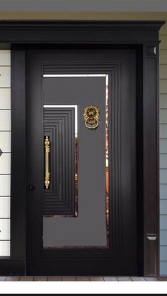 a black front door with gold accents