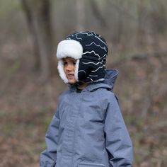 Our Toasty-Dry Trapper Hat keeps ears warm on the coldest days!    Water-Repellent: Water-repellent and windproof shell  Insulated: Temperature rated -15℃ / 5℉, with plush faux fur lining on earflaps  Gro-With-Me® : Adjustable cinch for growing kids. Size small features simple elastic instead of an adjustment  Versatile: Wear this ushanka hat 3 different ways with adjustable hook & loop closure  Easy Care: Machine washable, made with soil repellent fabric   Back to Trapper Hats | See more Kids W Winter Outdoor Hat With Ear Flaps, Winter Outdoor Hats With Ear Flaps, Winter Insulated Hat For Outdoor Activities, Windproof Hat For Winter Sports, Waterproof Winter Hats For Outdoor Activities, Windproof Hats For Winter Outdoor Activities, Windproof Hooded Hats For Outdoor, Black Winter Hats For Outdoor Activities, Outdoor Windproof Hooded Hats