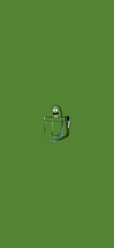 an image of a green bag with eyes on the side and handle hanging off it's sides