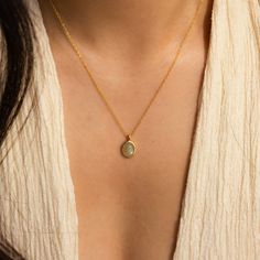 N A T U R A L ∙ L A B R A D O R I T E ∙ N E C K L A C E Our Natural Labradorite Necklace features a stunning Labradorite gemstone that shimmers with a captivating play of colors. The earthy tones and iridescent hues make it a perfect piece for adding a touch of natural elegance to any outfit. Wear this necklace to elevate your look with its unique and enchanting beauty ♡  * Material: High Quality Solid 925 Sterling Silver  * Finish: 18K Gold ∙ Sterling Silver  * Featuring ~16x5mm Natural Labrado Everyday Oval Birthstone Necklace, Minimalist Oval Pendant Birthstone Necklace, Minimalist Birthstone Necklace With Oval Pendant, Minimalist Birthstone Oval Pendant Necklace, Dainty Oval Necklaces For Everyday, Dainty Oval Necklace For Everyday Wear, Minimalist Oval Cabochon Necklace For Gift, Dainty Oval Everyday Necklace, Minimalist Oval Birthstone Necklace