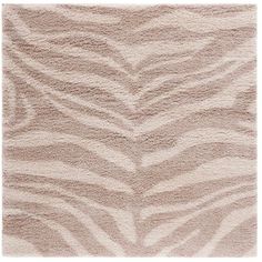 a beige rug with wavy lines on it