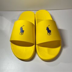 Mens Polo Ralph Lauren Signature Pony Slide Color: Yellow /Navy Men’s Size 13 Condition: Brand New No Box Note: Slight Intention On Front Of Right Slide, See Pictures. Usps Priority Mail Shipping 1 Day Processing Polo Slides Men, Yellow Non-slip Slides With Round Toe, Yellow Non-slip Round Toe Slides, Yellow Non-slip Slides, Yellow Slides With Rubber Sole And Round Toe, Yellow Slides With Round Toe And Rubber Sole, Yellow Flat Casual Slides, Casual Yellow Flat Slides, Yellow Cushioned Slides With Round Toe