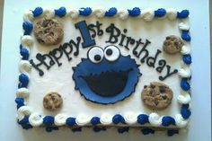 a birthday cake with cookies and cookie monster on it