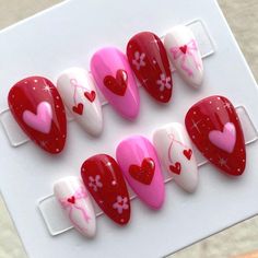 Sparkles, Hearts and daisies are perfect for Valentine's Day. Skip the countless hours sitting, and save your hard earned cash and get these handmade press on nails instead. Featuring bright pink and red; reflective glitter; hearts, cherries and bows; and little preppy daisies - these nails are made to order, reusable and oh so cute! Keeping it on trend for Valentine's Day, this nail set is sure to have you feeling festive, whatever the occasion. Whether you want to go the extra mile for a special event, or just want to feel fancy in your day to day life, these precious custom press on nails are for you. ✨ ✨FREE application kit included with first purchase! (includes alcohol wipe, glue, nail file and cuticle pusher) ✨ Make sure to read the instructions on how to accurately measure your nai Nails Pink And Red, Pink And Red Nails, Nails February, Nails Trending, Custom Press On Nails, Trending Nails, Go The Extra Mile, Nails Pink