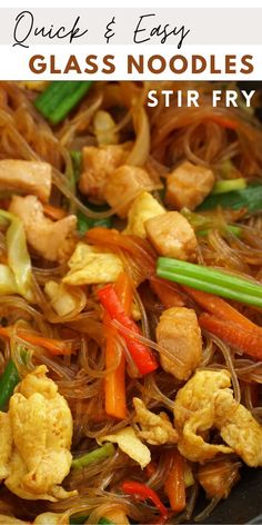 stir fry with chicken and vegetables in a wok on top of a white plate