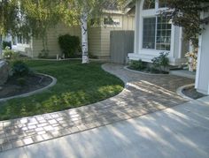 a house with landscaping in the front yard